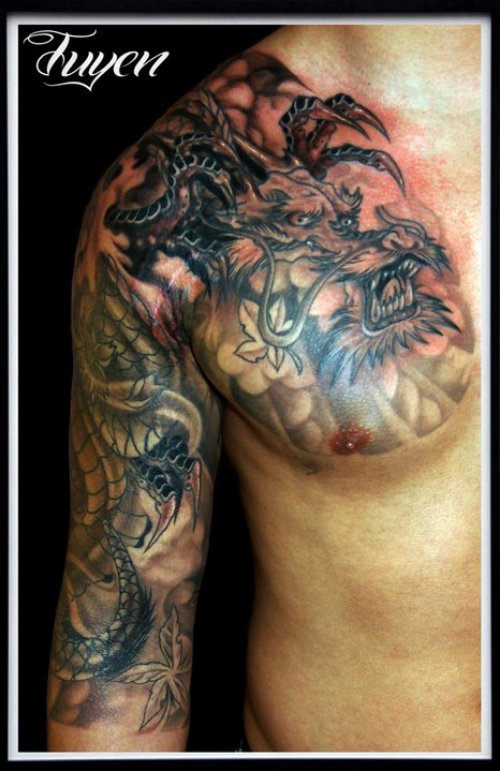 Right Sleeve And Chest Black And White Tattoo